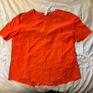 lululemon athletica Bright Orange Short Sleeve Tee